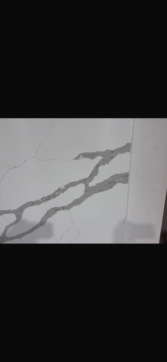 White quartz urface with grayish veins