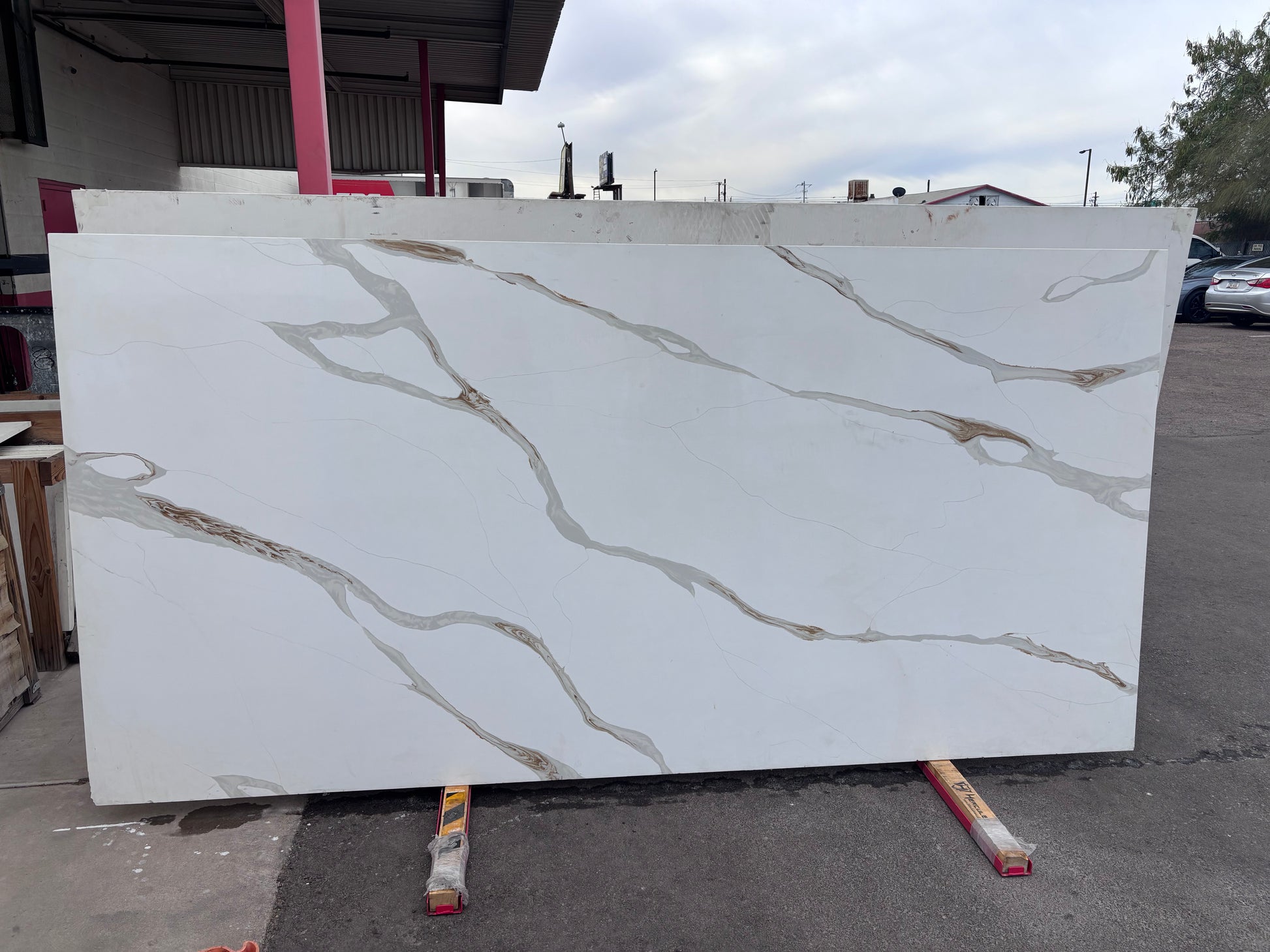 Marble-patterned stone slab with gold veins