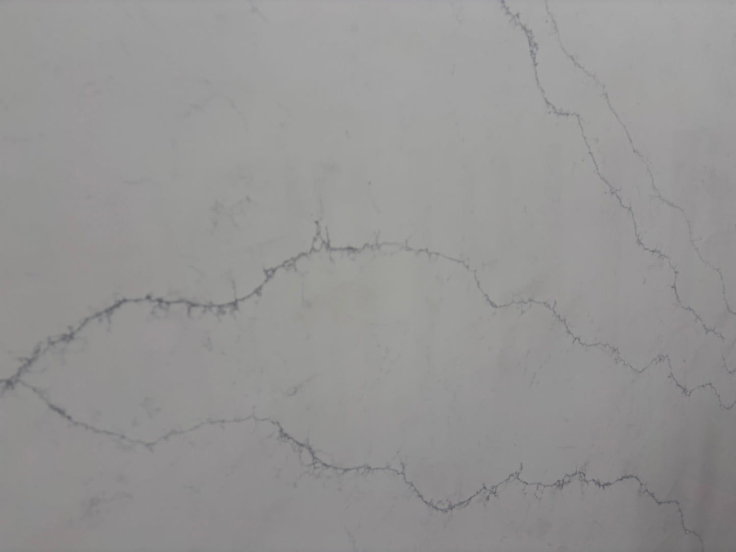 Gray marble looking quartz texture with subtle veining