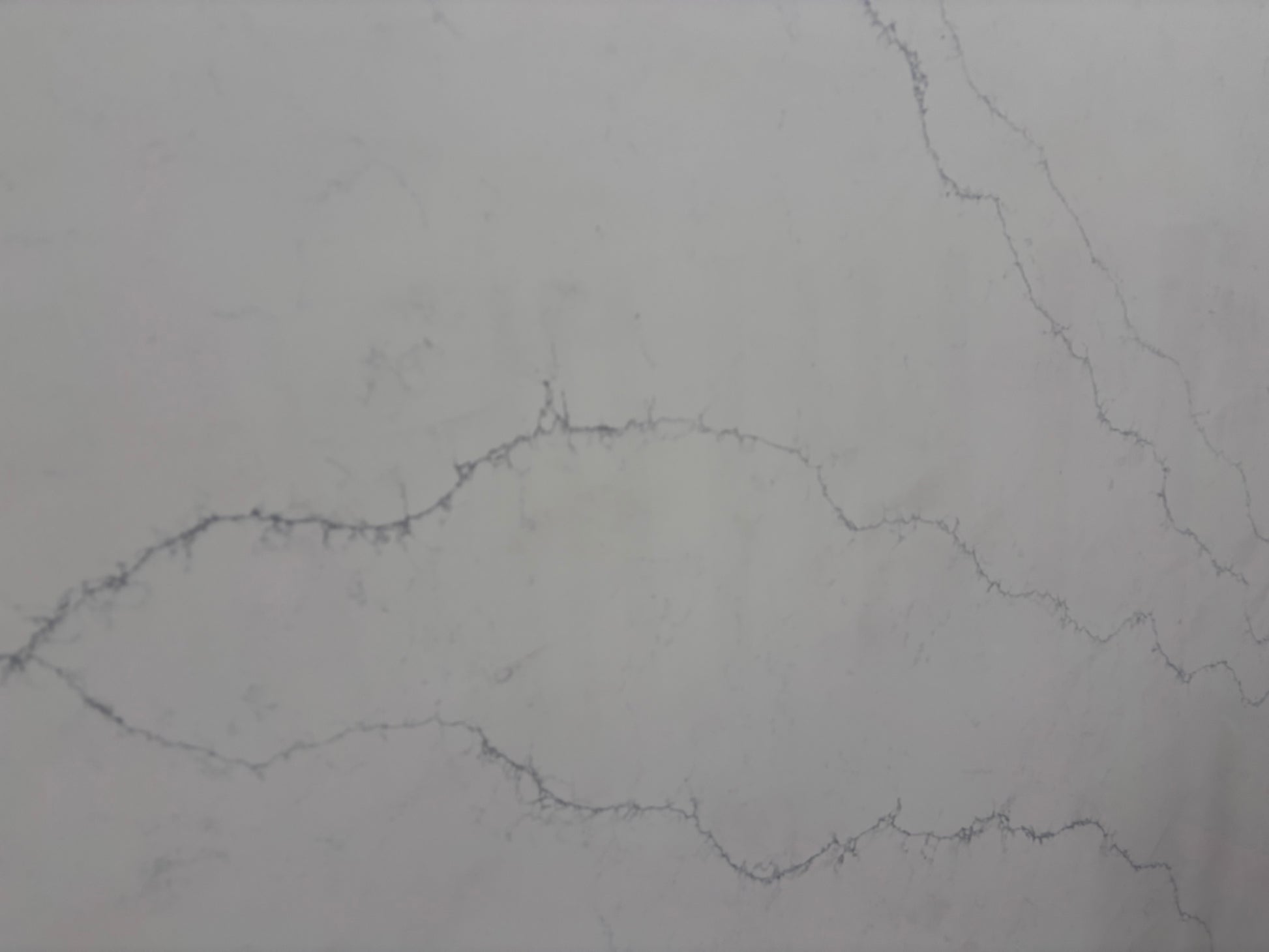Gray marble looking quartz texture with subtle veining