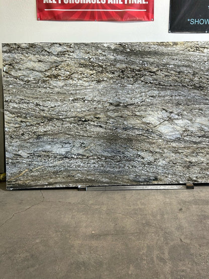 Beautiful granite. Gray, blue, brown striking veins putting together the perfect look for your kitchen.