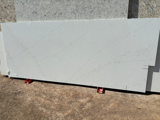 Off-white quartz remnant with thin golden veins. A beautiful quartz remnant at our Phoenix Boneyard near Tempe.