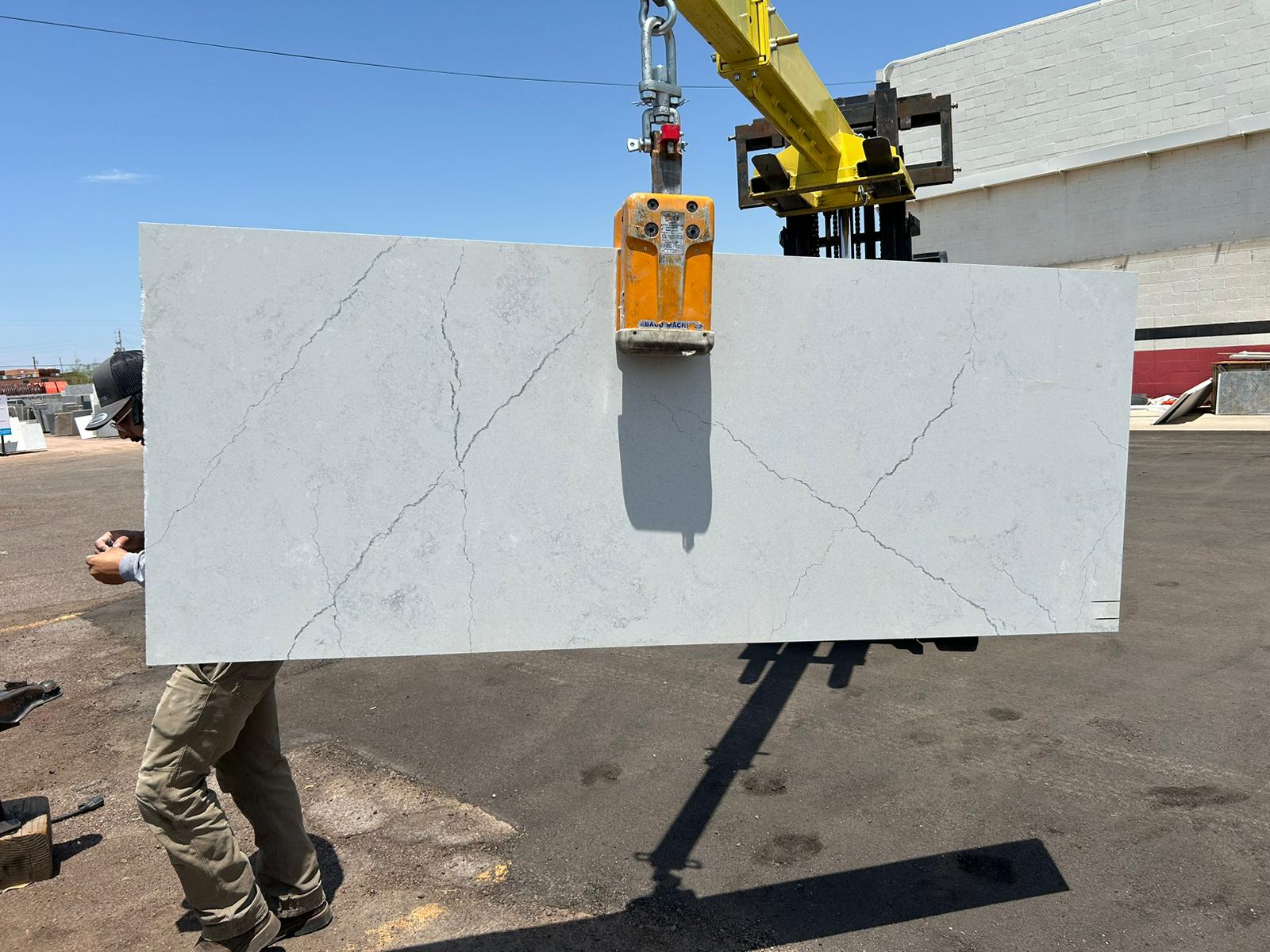 off-white quartz remnant with thin grey veins. Modern look quartz.