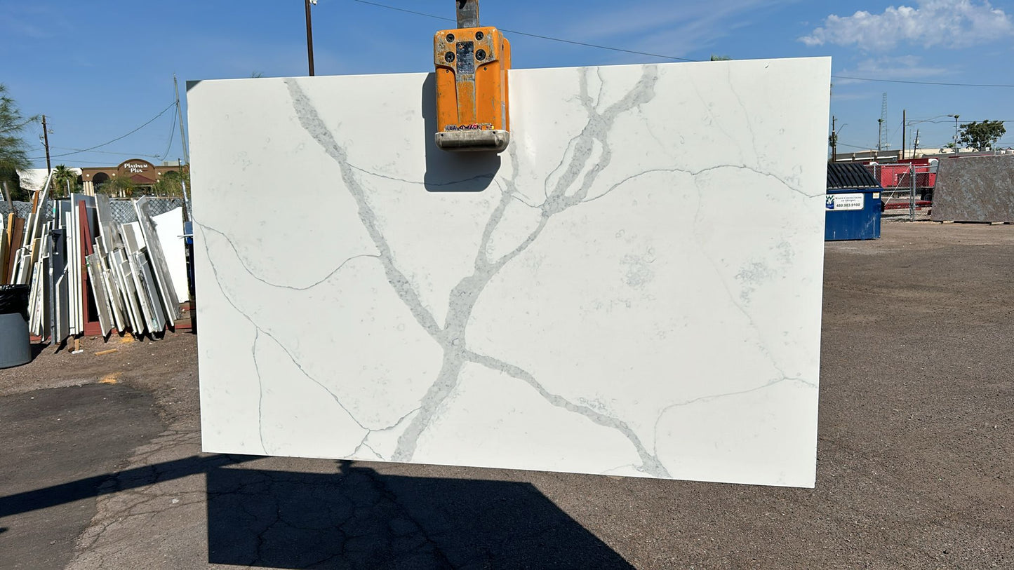 White Calacatta 2cm quartz countertops remnant. Gray veins. We are near gilbert