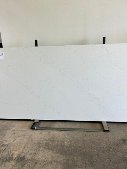 Polished white quartz with thin gray veins full slab countertop