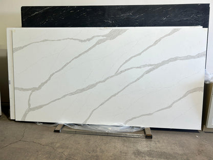 Italian style quartz slab countertops. 2CM full white slab with light gray veins.