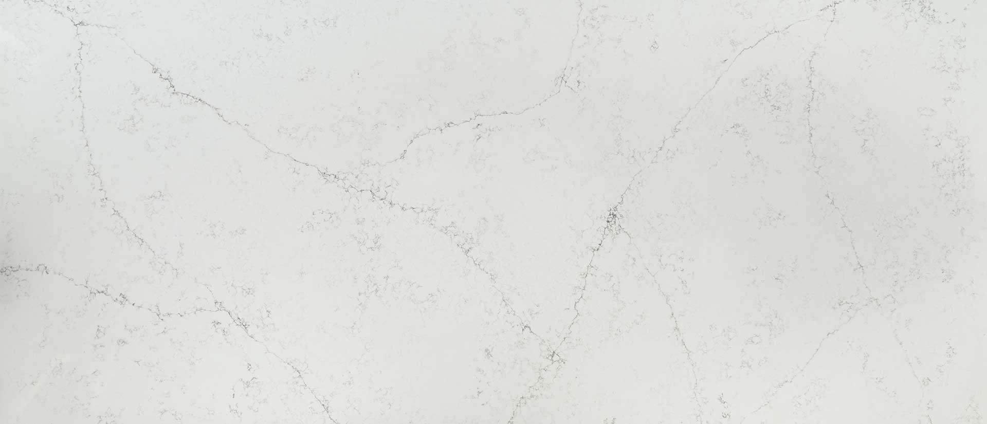 White quartz full slab with gray veining.