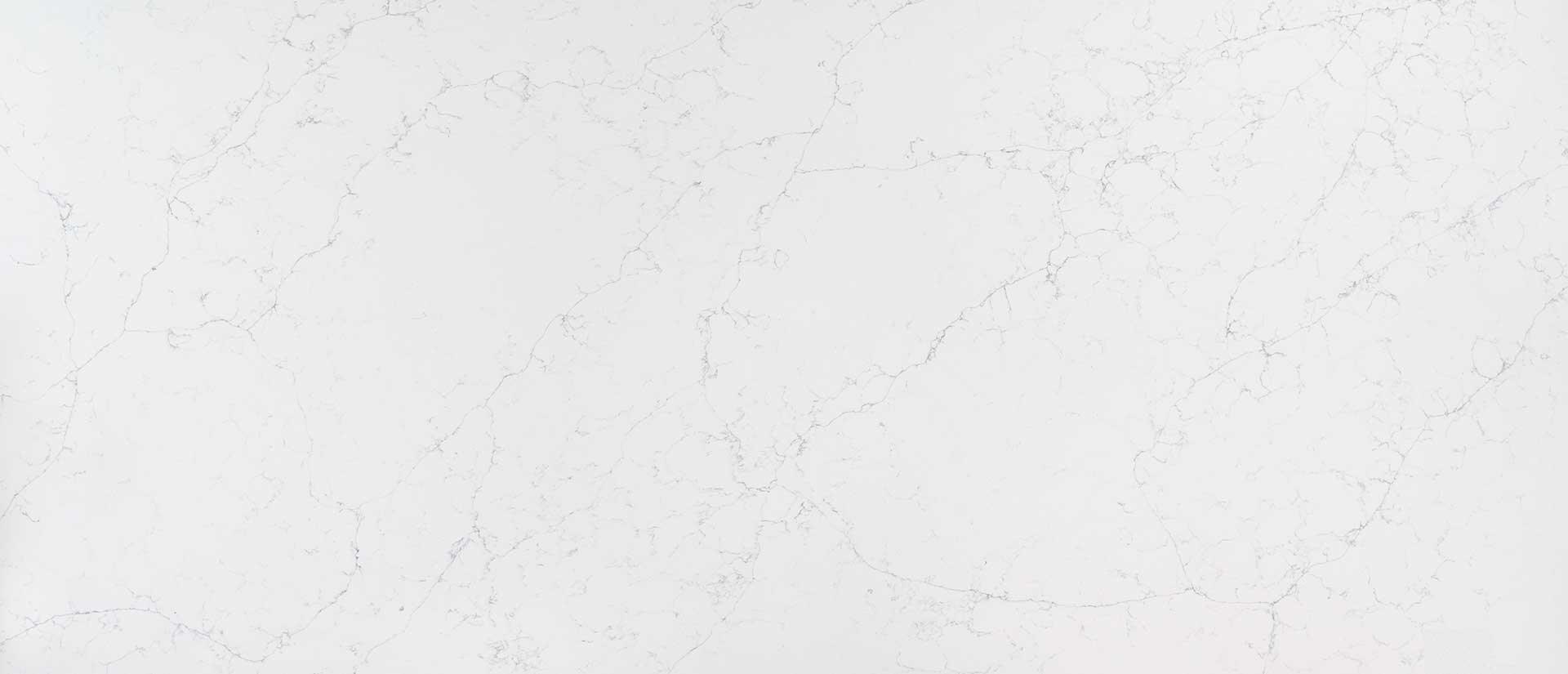 Polished White Quartz Quartz Full Slab countertop with subtle light gray veins.