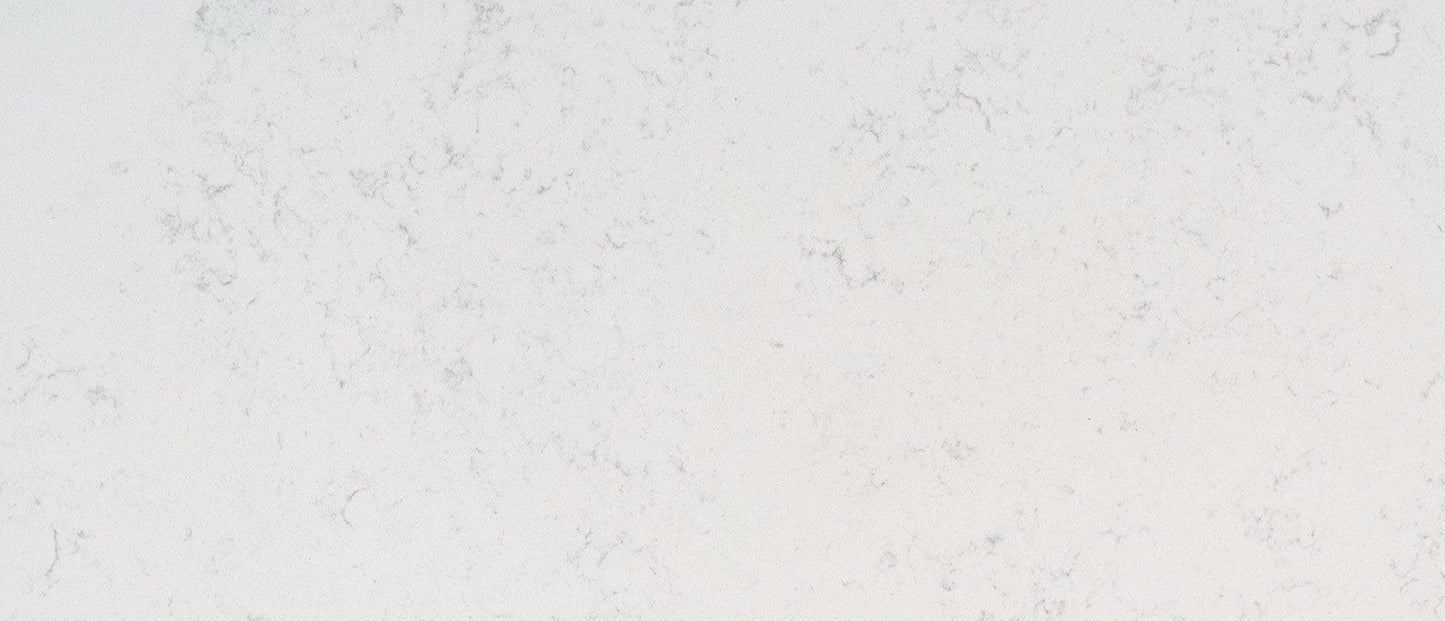 Smooth elegant design for a white quartz countertop slab available in 2cm and 3cm