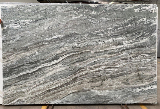 Natura stone granite. Gray, green, white and brown blended to match nature's beauty.